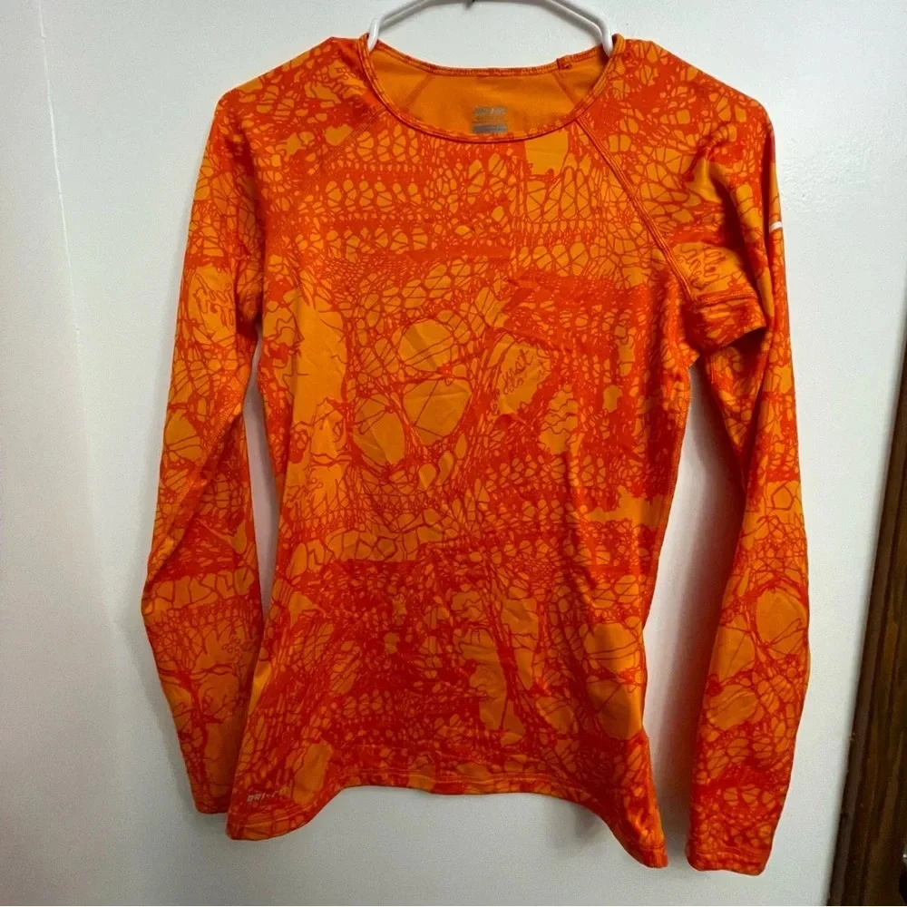 Nike Pro Stay Warm top in orange print size Small EUC - Picture 1 of 3
